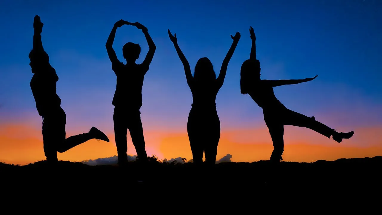 4 People each one making one alphabet from LOVE word